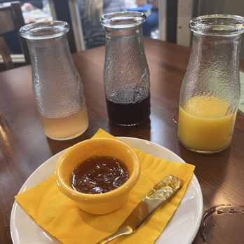 Auspicious Baking Company - The Mimosa Flight add-in's: grapefruit juice cordial, cranberry juice, orange juice, and orange marmalade! Mix in with champagne = delicious - Bakeries Near Me - Savannah, Georgia