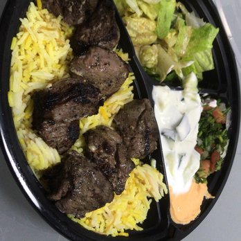 Pizzita Circle - Lamb with salad and mint dressing with tabouli , red pepper hummus and cucumbers - Pizza Near Me - Chino, California Pizzita Circle - Lamb with salad and mint dressing with tabouli , red pepper hummus and cucumbers - Pizza Near Me - Chino, California