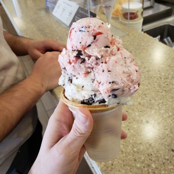 Graeter's Ice Cream - Cherry chocolate chip stacked on coconut chocolate chip in a pretzel cone - Ice Cream & Frozen Yogurt Near Me - Louisville, Kentucky Graeter's Ice Cream - Cherry chocolate chip stacked on coconut chocolate chip in a pretzel cone - Ice Cream & Frozen Yogurt Near Me - Louisville, Kentucky