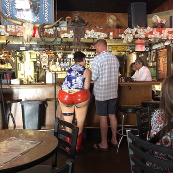 Rusty Spur Saloon - Comical bar stools - Music Venues Near Me - Scottsdale, Arizona Rusty Spur Saloon - Comical bar stools - Music Venues Near Me - Scottsdale, Arizona