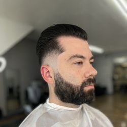 Refined Barber Collective - Mid Skin Fade with Slicked Back Top & Straight Razor Beard Lining