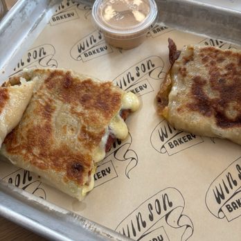 Win Son Bakery - Bacon, Egg and cheese on a scallion pancake. Yum! - Bakeries Near Me - New York, New York Win Son Bakery - Bacon, Egg and cheese on a scallion pancake. Yum! - Bakeries Near Me - New York, New York