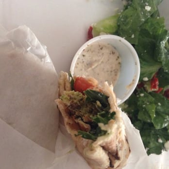 Dallah Mediterranean Cuisine - Falafel wrap with salad. Healthy deliciousness. - Mediterranean Near Me - San Antonio, Texas Dallah Mediterranean Cuisine - Falafel wrap with salad. Healthy deliciousness. - Mediterranean Near Me - San Antonio, Texas