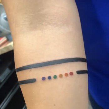 Blue Collar Tattoo - My fiancées tattoo of bands around her arm - Tattoo Near Me - Costa Mesa, California Blue Collar Tattoo - My fiancées tattoo of bands around her arm - Tattoo Near Me - Costa Mesa, California