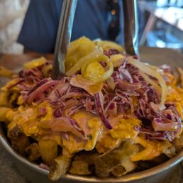 Loaded fries with pimento cheese and coleslaw