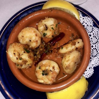 The Columbia - Gambas "Al Ajillo" Spain's most popular- sautéed in extra virgin Spanish olive oil, fresh garlic and chili pepper. - Spanish Near Me - St Augustine, Florida The Columbia - Gambas "Al Ajillo" Spain's most popular- sautéed in extra virgin Spanish olive oil, fresh garlic and chili pepper. - Spanish Near Me - St Augustine, Florida