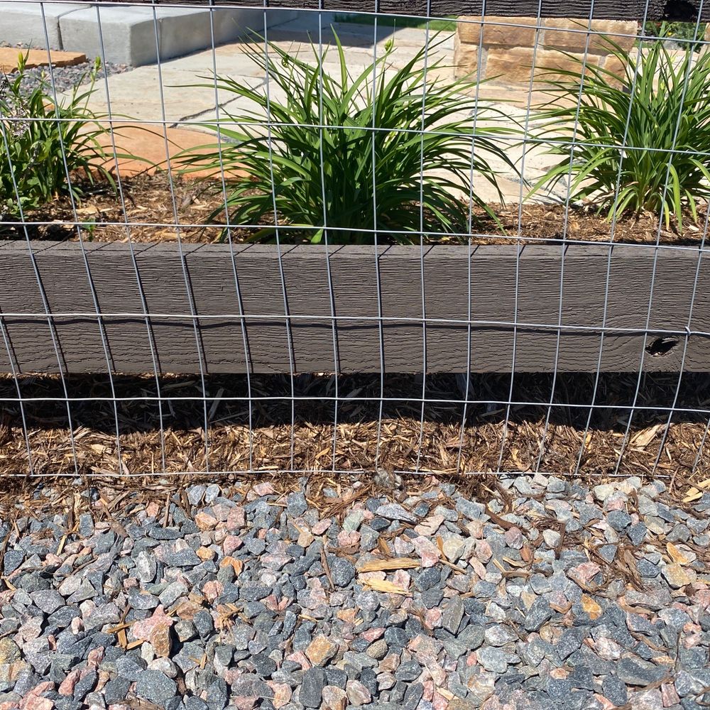 FRSR - Placed bark & plants as you would against a solid fence EXCEPT it's an open fence - Landscaping Near Me - Broomfield, Colorado FRSR - Placed bark & plants as you would against a solid fence EXCEPT it's an open fence - Landscaping Near Me - Broomfield, Colorado