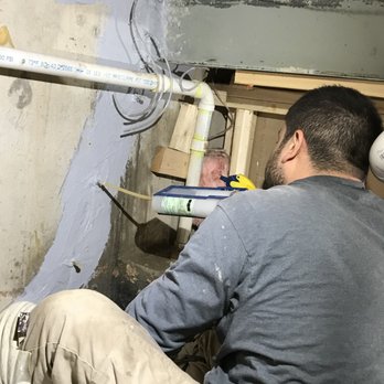 Abate Restoration - Injecting polyurethane in leaking crack. - Damage Restoration Near Me - Lake Barrington, Illinois Abate Restoration - Injecting polyurethane in leaking crack. - Damage Restoration Near Me - Lake Barrington, Illinois