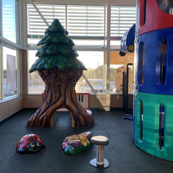 McDonald's - a play area with a tree and toys - Burgers Near Me - Springville, Utah McDonald's - a play area with a tree and toys - Burgers Near Me - Springville, Utah