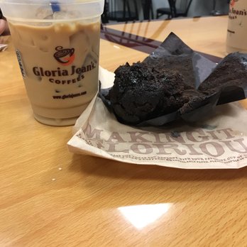 Gloria Jeans Coffees - a cup of coffee and a half eaten brownie - Coffee & Tea Near Me - Baraboo, Wisconsin Gloria Jeans Coffees - a cup of coffee and a half eaten brownie - Coffee & Tea Near Me - Baraboo, Wisconsin