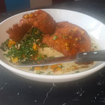 Silver Diner - Chicken and Grits accompanied by kale and butternut squash. - Diners Near Me - Woodbridge, Virginia