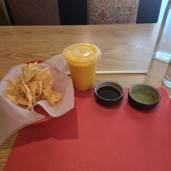 Taj Indian Bistro - Mango Lassi, complimentary chips and chutney - Indian Near Me - Cary, North Carolina Taj Indian Bistro - Mango Lassi, complimentary chips and chutney - Indian Near Me - Cary, North Carolina