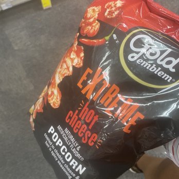 CVS Pharmacy - a hand holding a bag of chips - Drugstores Near Me - Coconut Grove, Florida CVS Pharmacy - a hand holding a bag of chips - Drugstores Near Me - Coconut Grove, Florida