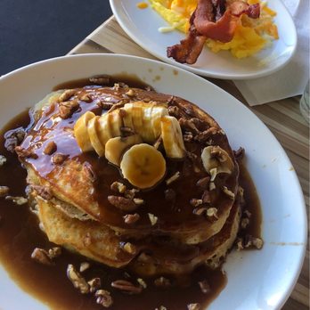 Another Broken Egg Cafe - Bananas Foster Pancakes with eggs and bacon side - Cafes Near Me - Memphis, Tennessee