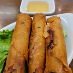 Grilled Pork on Skewers and Egg Roll