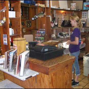 Wagon Wheel Restaurant - Here's the cashier's station and the gift shop, with the camera-shy gal at her station. - American Near Me - Needles, California Wagon Wheel Restaurant - Here's the cashier's station and the gift shop, with the camera-shy gal at her station. - American Near Me - Needles, California