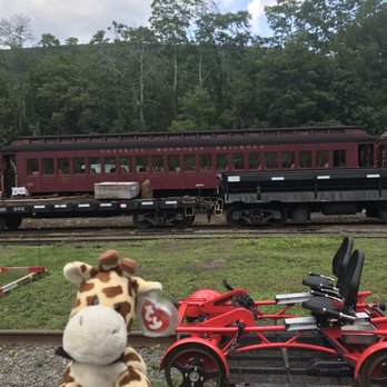 Rail Explorers - Catskills Division - Owen the Hipster posing by the vehicle. - Tours Near Me - Phoenicia, New York