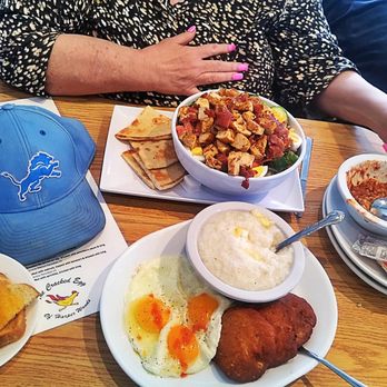 The Cracked Egg - a woman eating breakfast - Breakfast & Brunch Near Me - Harper Woods, Michigan The Cracked Egg - a woman eating breakfast - Breakfast & Brunch Near Me - Harper Woods, Michigan