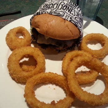 Smokey Bones - Southwest Scorcher Burger with Onion Rings - Barbeque Near Me - Colonie, New York Smokey Bones - Southwest Scorcher Burger with Onion Rings - Barbeque Near Me - Colonie, New York