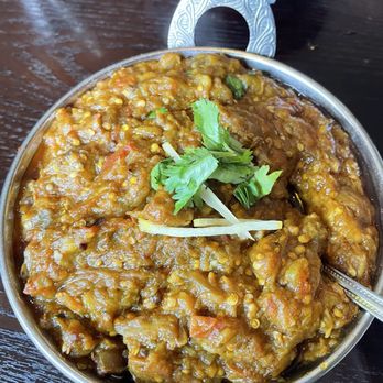 Saaz Indian Cuisine - Baingan Bhurta (Eggplant with onions and tomatoes) - Indian Near Me - Southampton, New York Saaz Indian Cuisine - Baingan Bhurta (Eggplant with onions and tomatoes) - Indian Near Me - Southampton, New York