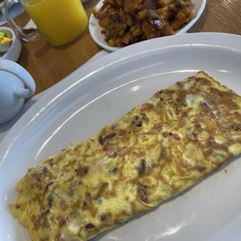 Anthony's Pancake  House - My egg omelet with cheese, bacon and ham with a side of home fries. - Waffles Near Me - Montauk, New York