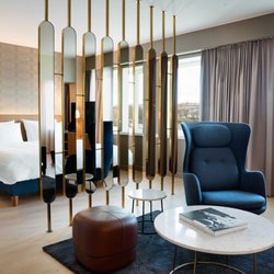 Radisson Blu Atlantic Hotel - Atlantic suite. Have 2 king size bed and 2 bathrooms. A small lounge and a dining table for 4.