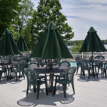 Dockers Seafood & Grille - tables and umbrellas - American Near Me - Rose, New York Dockers Seafood & Grille - tables and umbrellas - American Near Me - Rose, New York