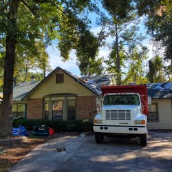 Apachee Roofing - Installation of a 50yr Hunter Green shingle roof