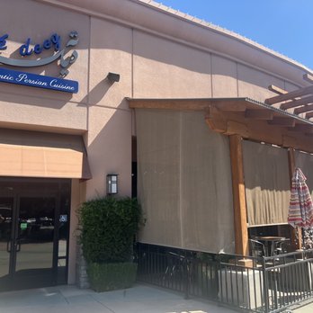 Tah Deeg Persian Cuisine - Outside sign and patio area - Persian/Iranian Near Me - Clovis, California Tah Deeg Persian Cuisine - Outside sign and patio area - Persian/Iranian Near Me - Clovis, California
