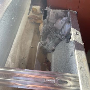 River City Gutters - Excessive sealant with standing water. Future Insect breeding ground. - Gutter Services Near Me