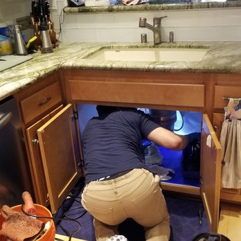 Discount Plumbing Rooter - Joseph working in tight quarters to clear my clogged kitchen drain - Plumbing Near Me - San Diego, California Discount Plumbing Rooter - Joseph working in tight quarters to clear my clogged kitchen drain - Plumbing Near Me - San Diego, California