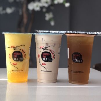 Kung Fu Tea - Left (mango slush w/ mango popping boba) Middle (signature KF milk tea) Right (honey green tea) - Juice Bars & Smoothies Near Me - Baton Rouge, Louisiana Kung Fu Tea - Left (mango slush w/ mango popping boba) Middle (signature KF milk tea) Right (honey green tea) - Juice Bars & Smoothies Near Me - Baton Rouge, Louisiana