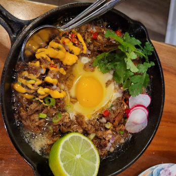 Kamayan Atl - Sizzling sisig (slow roasted pork belly, chopped cheek and snout pate) - Filipino Near Me - Doraville, Georgia