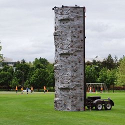 Carolina Fun Factory - Portable Rock Climbing wall adds an extra element of challenge and engagement with your guests.
