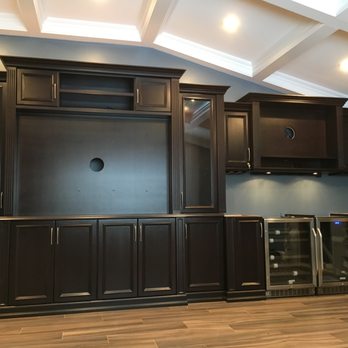 SAS Home Improvements - a large entertainment center - General Contractors Near Me
