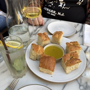Trattoria Servino - Focaccia bread with a olive oil rosemary - Italian Near Me - Belvedere, California Trattoria Servino - Focaccia bread with a olive oil rosemary - Italian Near Me - Belvedere, California