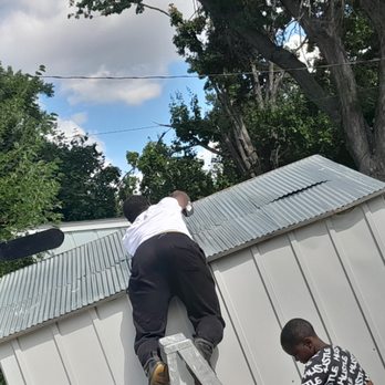 Affordable cut & go pro - a man on a ladder - Lawn Services Near Me