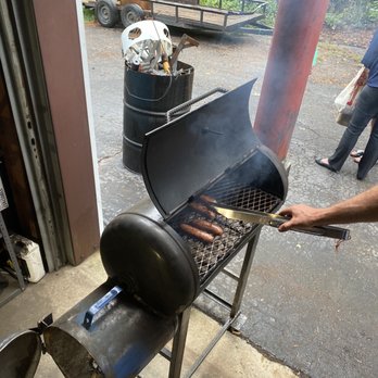 Blue Arc Metals - Grilling on an apartment sized hand-made grill - Metal Fabricators Near Me - Greenville, South Carolina