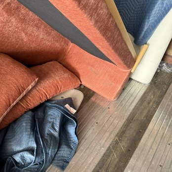 All Around Movers - Sofa bad headboard on the arm, placed directly on ground, with my headboard in the background. - Movers Near Me - Salem, Oregon