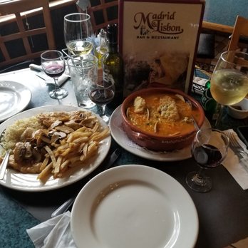 Madrid & Lisbon Bar & Restaurant - two plates of food on a table - Spanish Near Me - Newark, New Jersey Madrid & Lisbon Bar & Restaurant - two plates of food on a table - Spanish Near Me - Newark, New Jersey