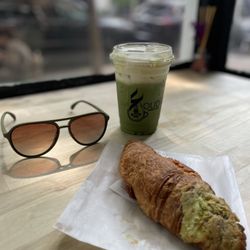 Oud Coffee & Cafe - Lavender foam matcha and pistachio croissant