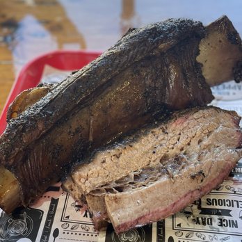 Fikscue Craft BBQ - a piece of meat on a red tray - Barbeque Near Me - Alameda, California Fikscue Craft BBQ - a piece of meat on a red tray - Barbeque Near Me - Alameda, California