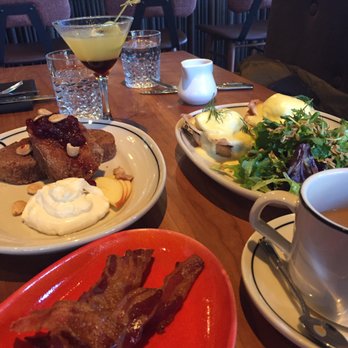 The Carlile Room - A side of Bavarian meats bacon, deep fried French toast, eggs Benedict, coffee and drink your juice... - New American Near Me - Seattle, Washington