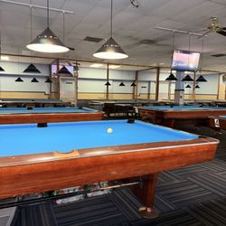 Elite Billiard - Billiards tables, semi bright lighting, ping pong cages in the back :)