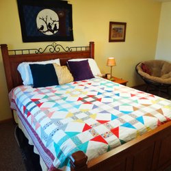 Crow Moon Healing - Private Getaway includes sitting area, and kitchen.