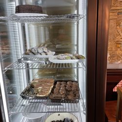 Double chocolate cake, two kinds of cannoli's, tiramisu, and profiteroles in chocolate.