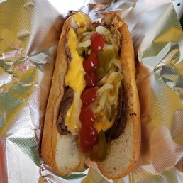 Cheesesteak with peppers, onions, and ketchup. Cheesesteak with peppers, onions, and ketchup.