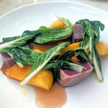Verde Mesa - Yellow fin tuna with roasted pumpkin, bok choy, and ginger. It may not be clear from the photo, but it's a very big portion. - Caribbean Near Me - San Juan, Puerto Rico Verde Mesa - Yellow fin tuna with roasted pumpkin, bok choy, and ginger. It may not be clear from the photo, but it's a very big portion. - Caribbean Near Me - San Juan, Puerto Rico