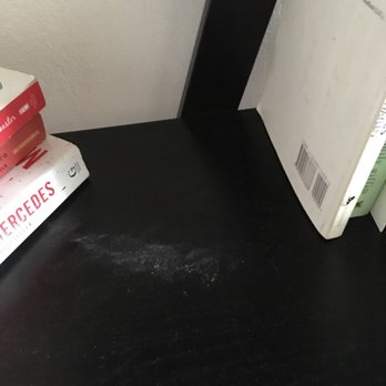 Chicago Clean Home - Dust from between books, even though supposedly cleaned - Home Cleaning Near Me - Chicago, Illinois
