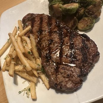 Sedona Taphouse - Chantilly - Hand Cut NY Strip with Side Brussels and Truffle Fries - Seafood Near Me - Chantilly, Virginia Sedona Taphouse - Chantilly - Hand Cut NY Strip with Side Brussels and Truffle Fries - Seafood Near Me - Chantilly, Virginia